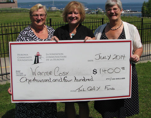 Large cheque presentation to Warm adn Cosy of $1400 from the T and L Gay Fund